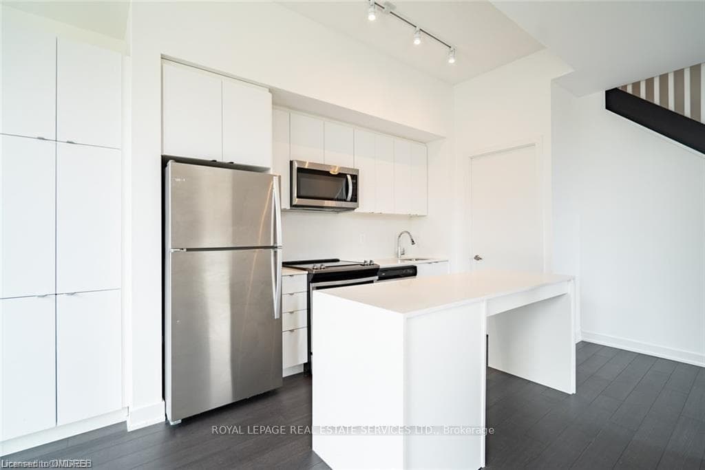 Bright White Kitchen w/ SS Appliances