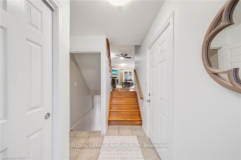 foyer with closet on the left and garage on right