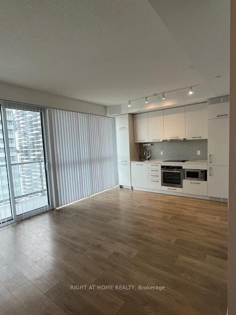 Kitchen, Living & Balcony