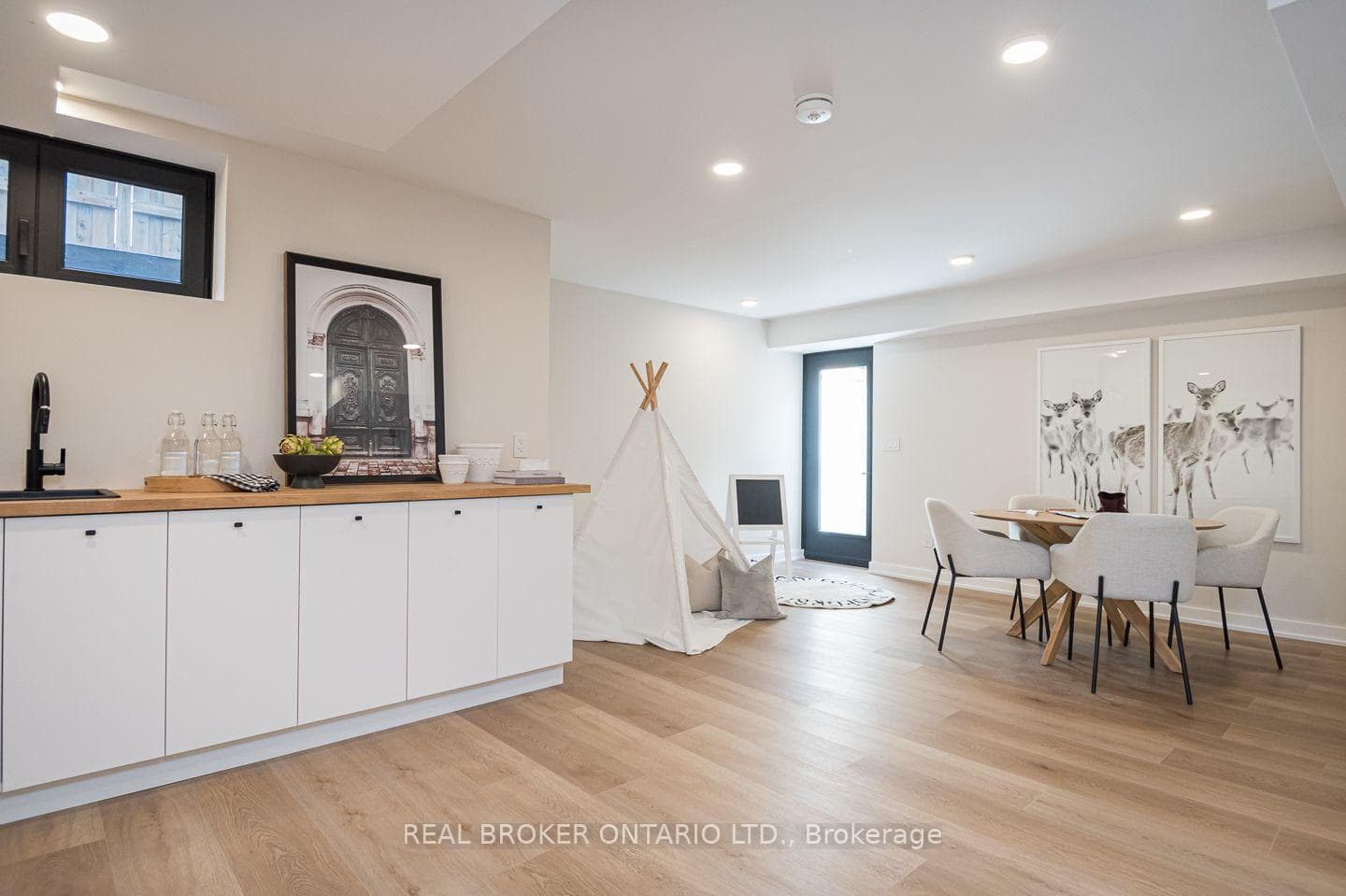 basement rec room with walk-up to yard
