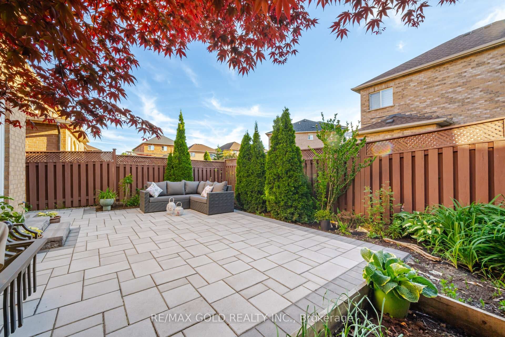 Spacious backyard with vegetable garden