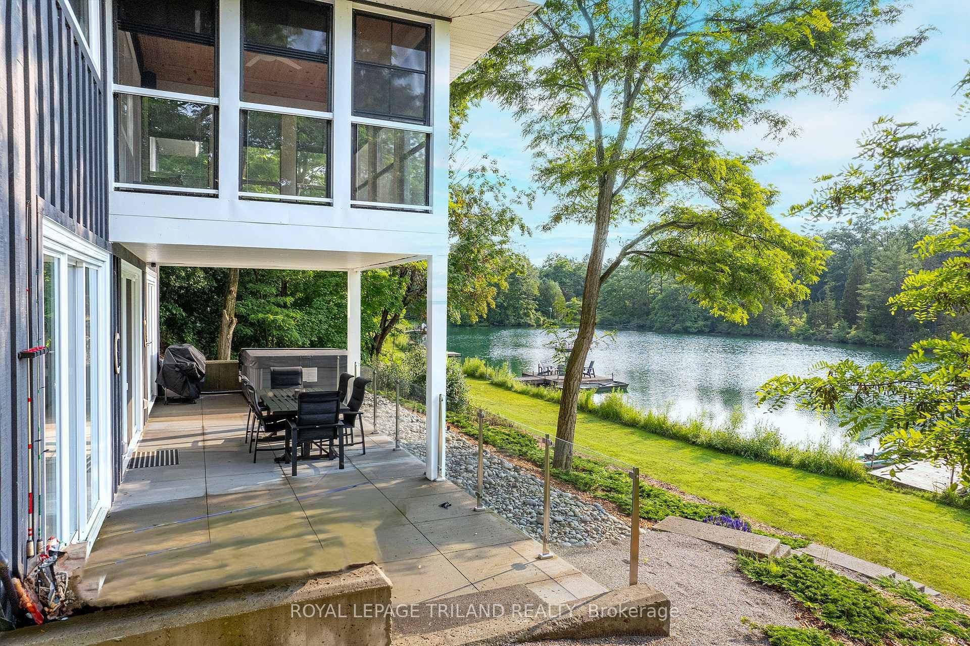 Stunning lakefront sun room & walk-out lower level