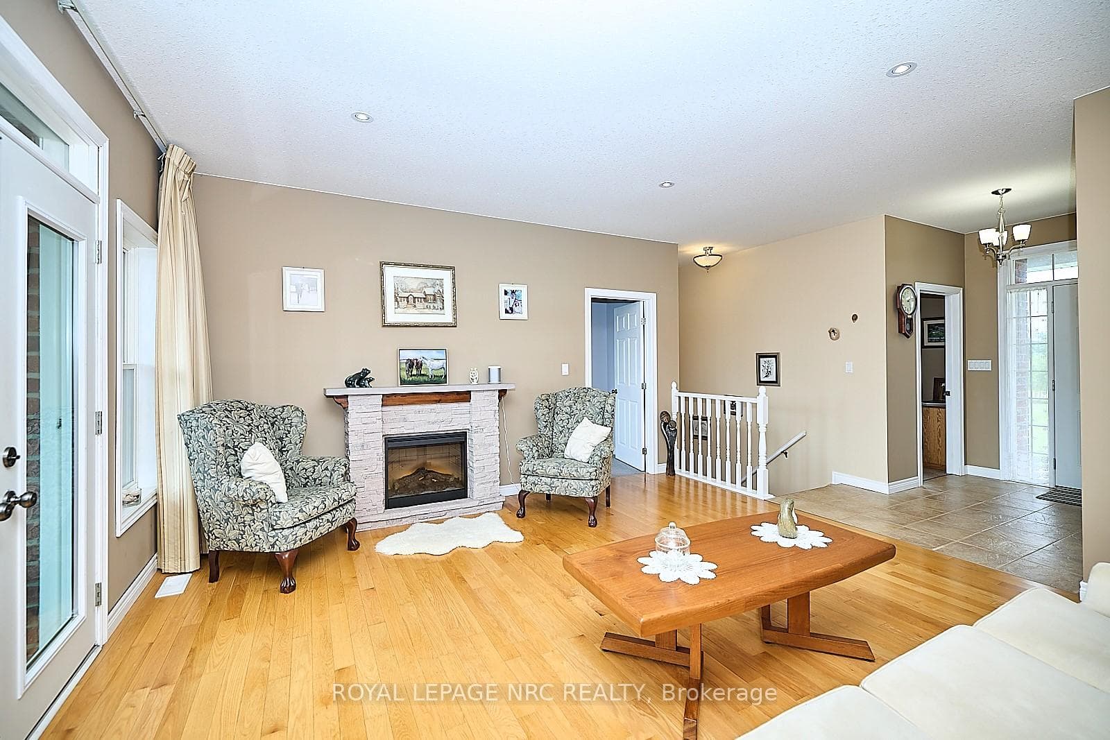 Family Room with electric F/P & patio doors