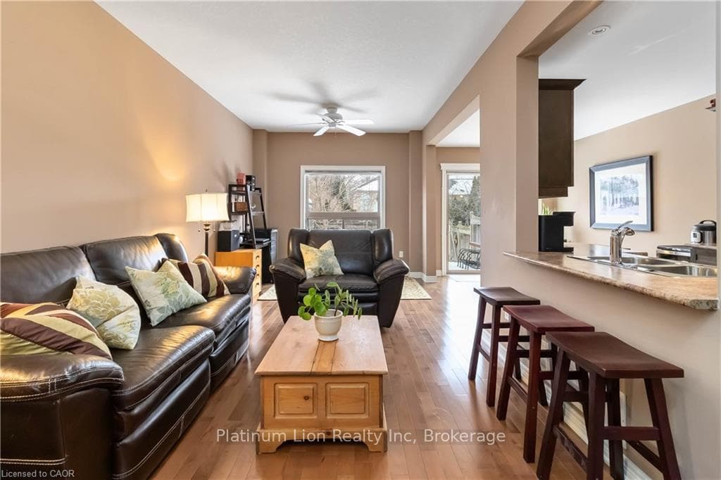 Tall ceilings + hardwood and tile flooring