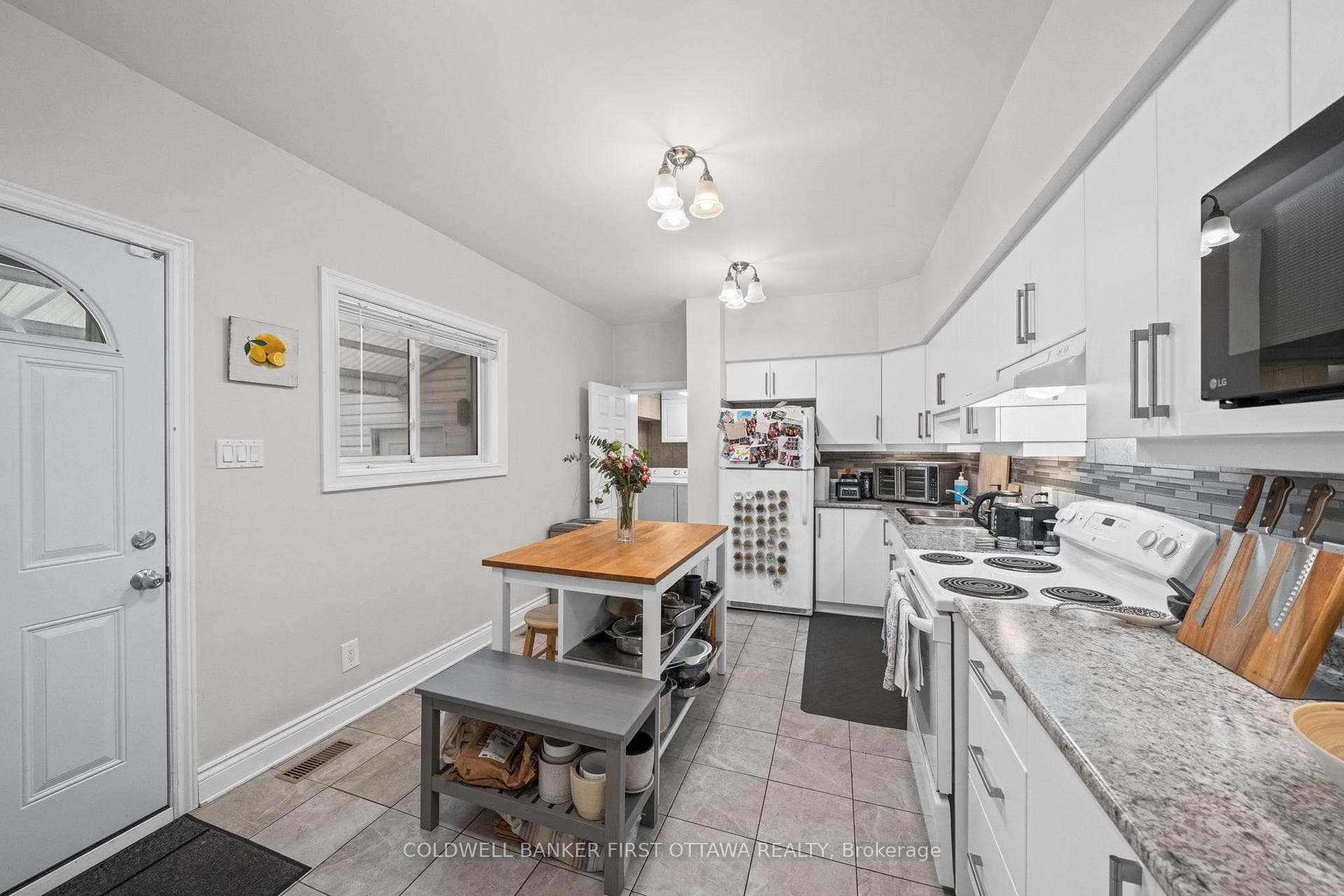 Kitchen w side door private access from parking.