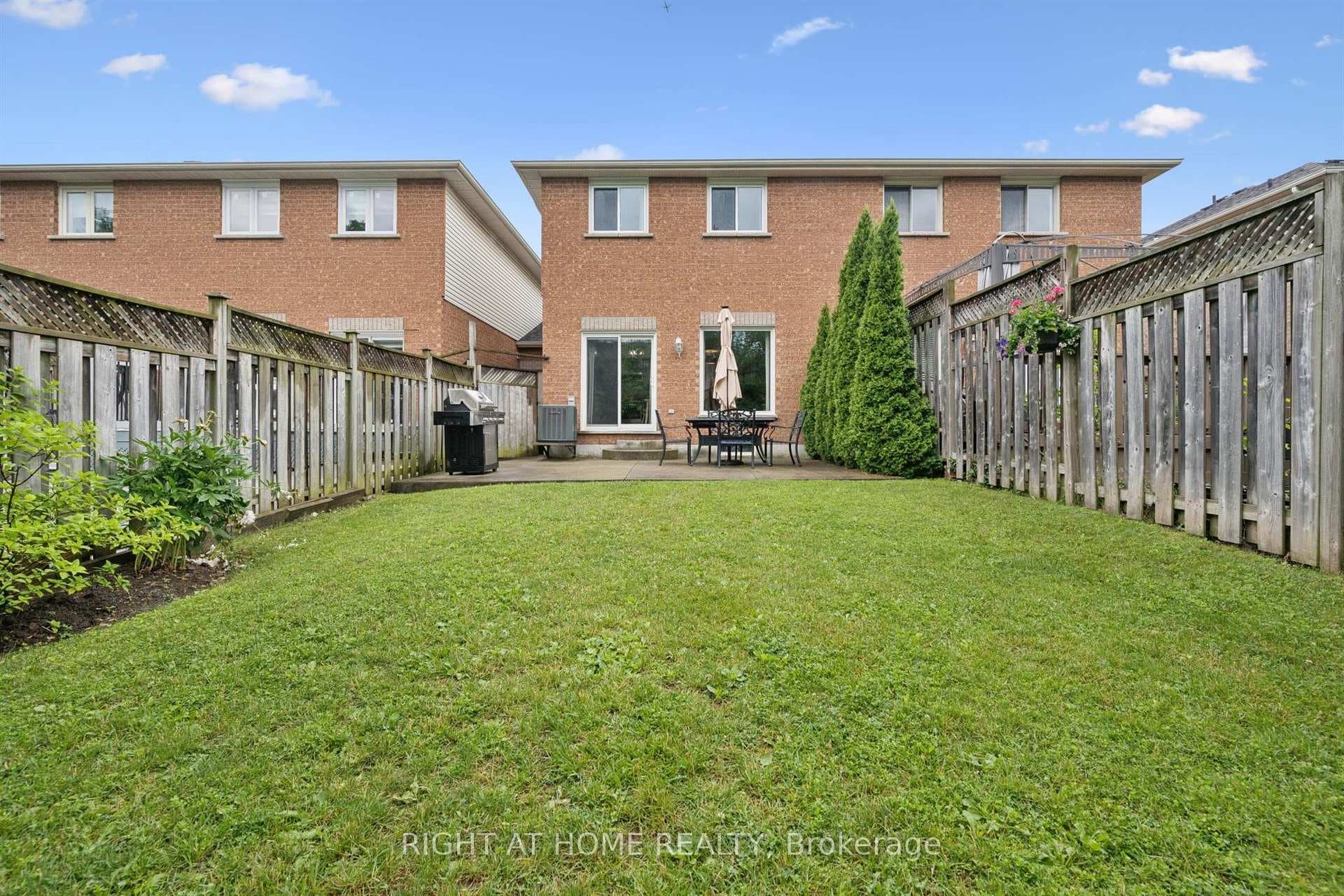 Fenced backyard with room for kids, pets, and play