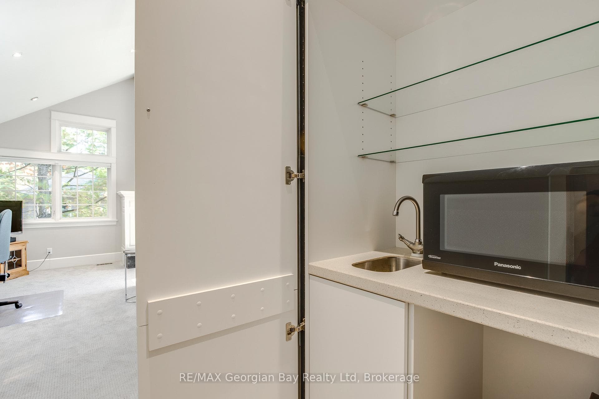 Wet bar in primary suite