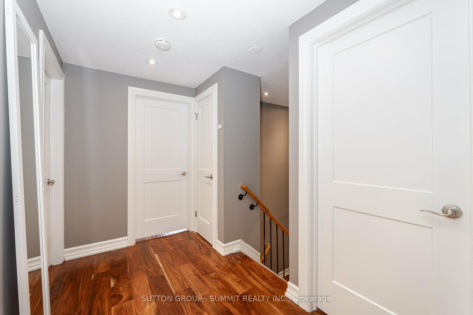 Scrapped walnut floors lead to FOUR bedrooms
