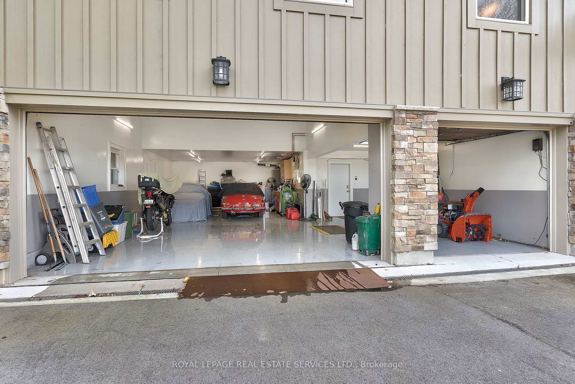 5-Car Garage w/ Heated Epoxy Floor and 17' Ceiling