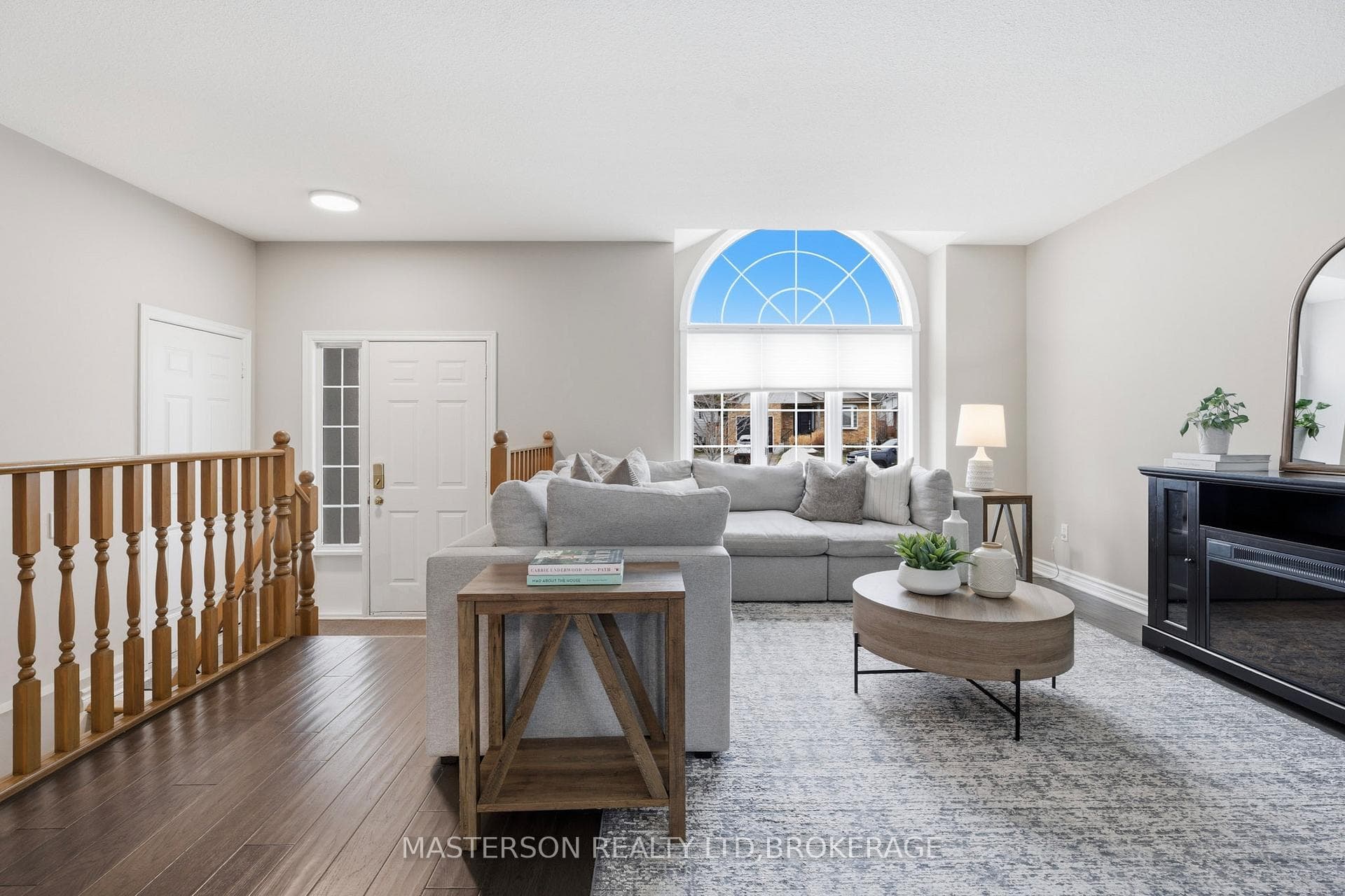 LIVING ROOM AND FRONT DOOR