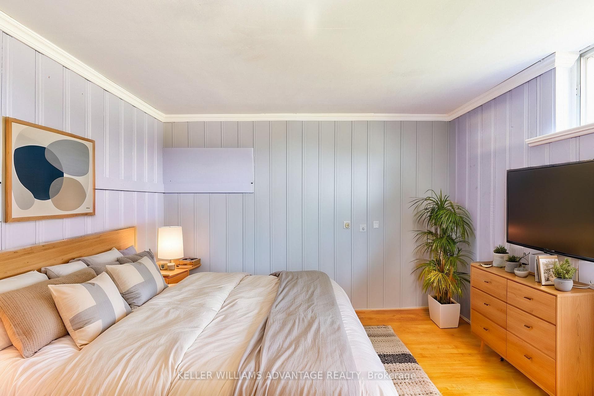 Virtually staged lower bedroom