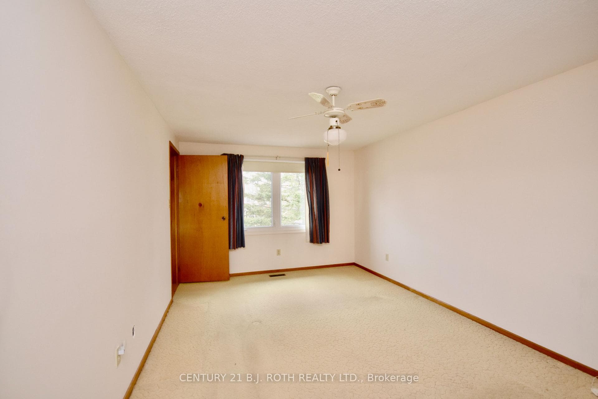 Primary bedroom with walk in closet & semi-ensuite