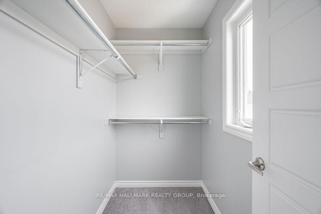 Walk-In Closet in Primary Bedroom