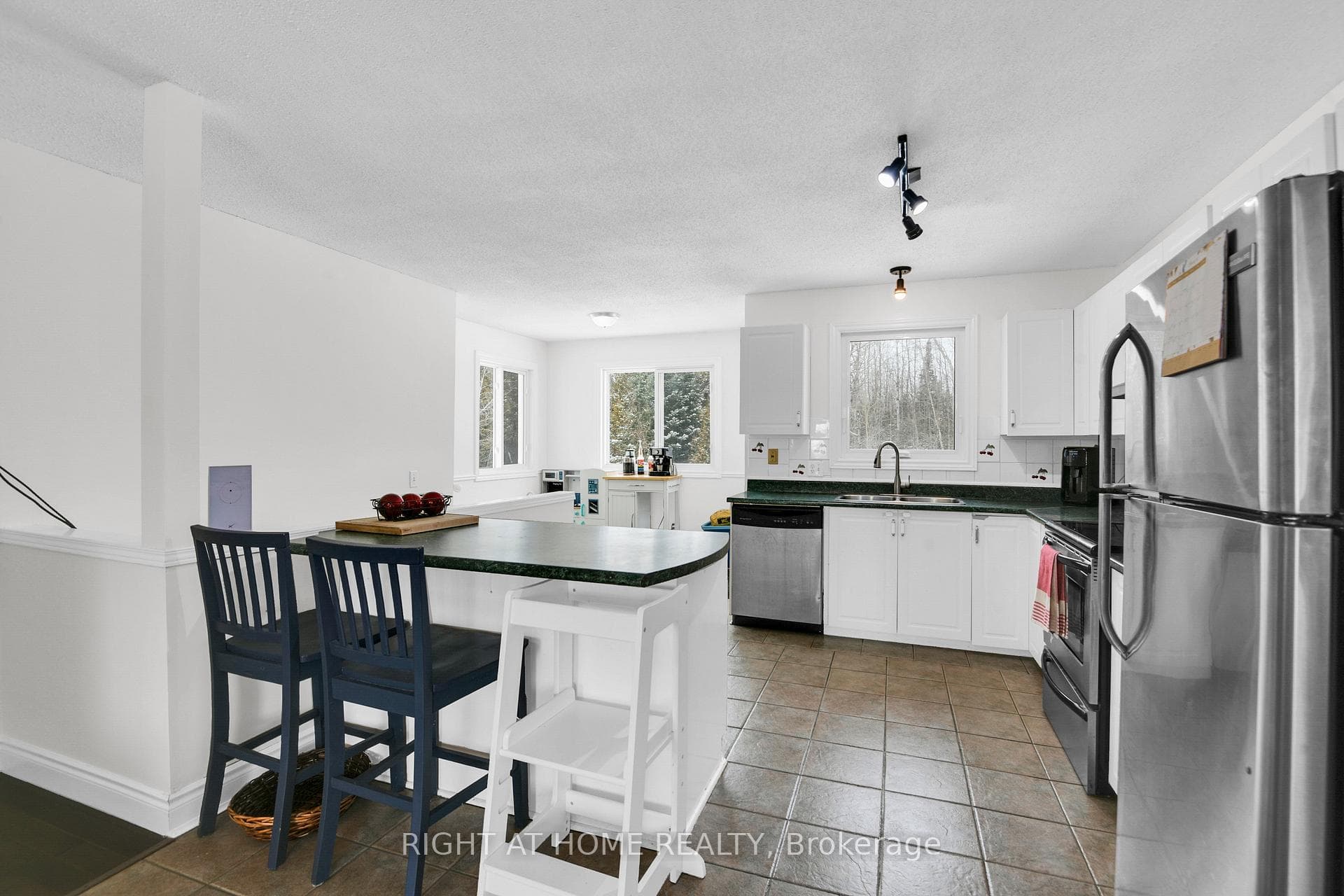 Large & bright kitchen overlooking the forest