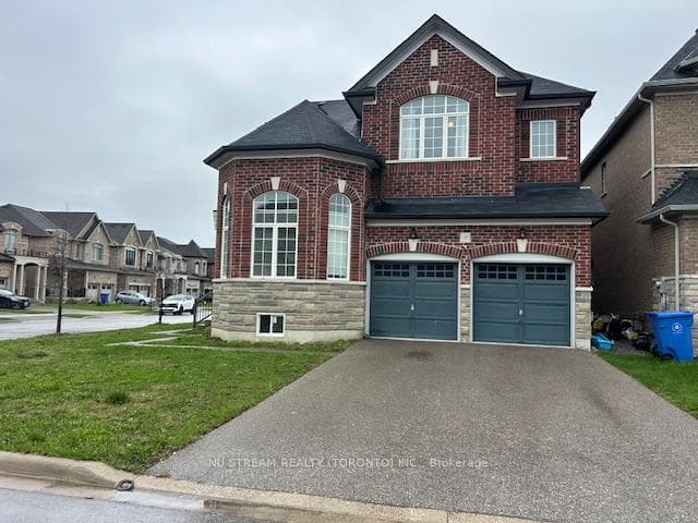 Double Car Garage With Long Driveway