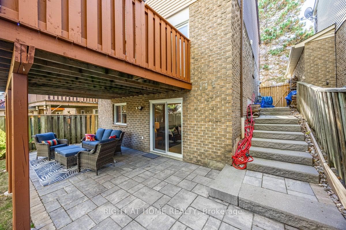 Side Entrance to Basement, patio and yard
