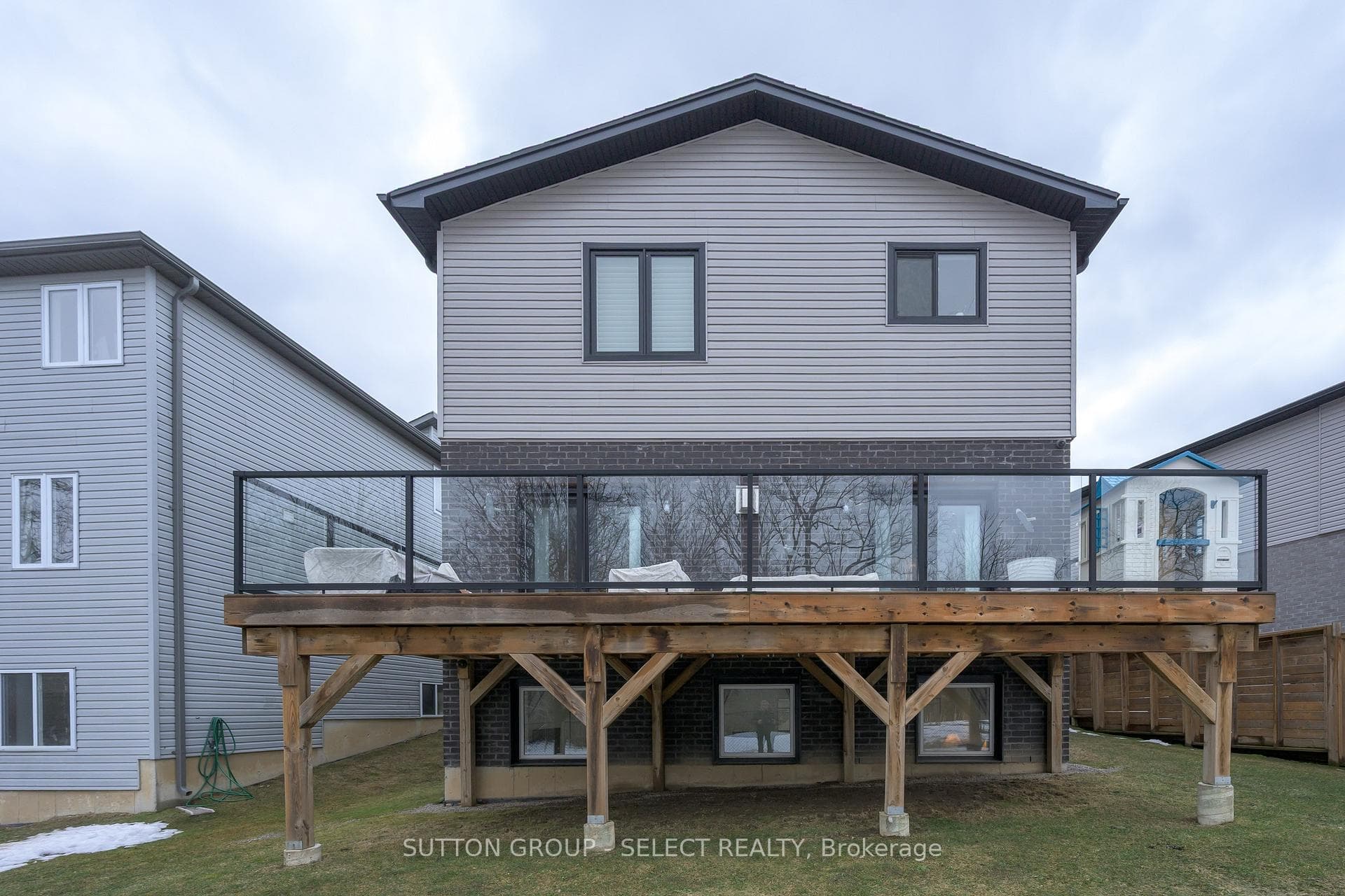 large deck/glass rail & unobstructed forest view