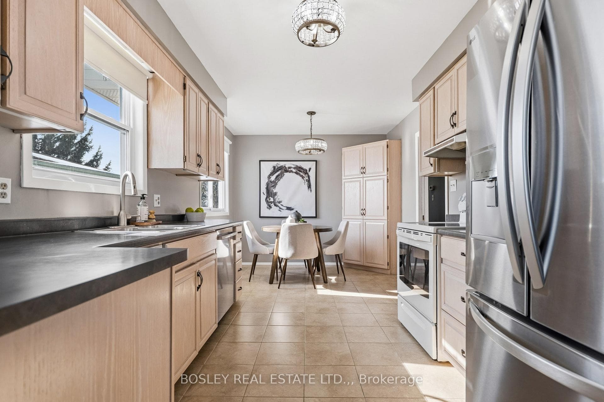 eat-in kitchen with lots of cabinetry