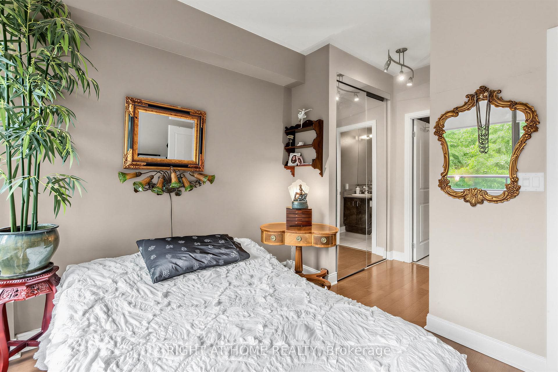 2 Double Mirrored Custom Closets in Master Bedroom