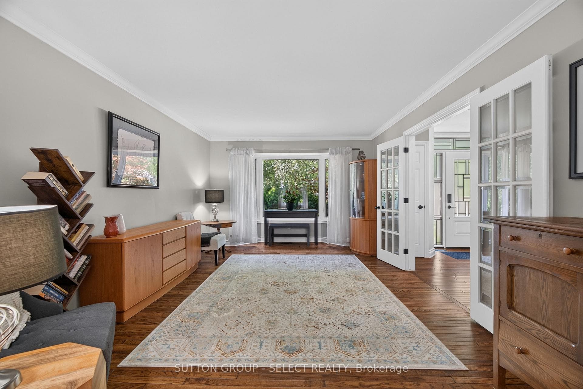 Living room with Hardwood floor & French Doors