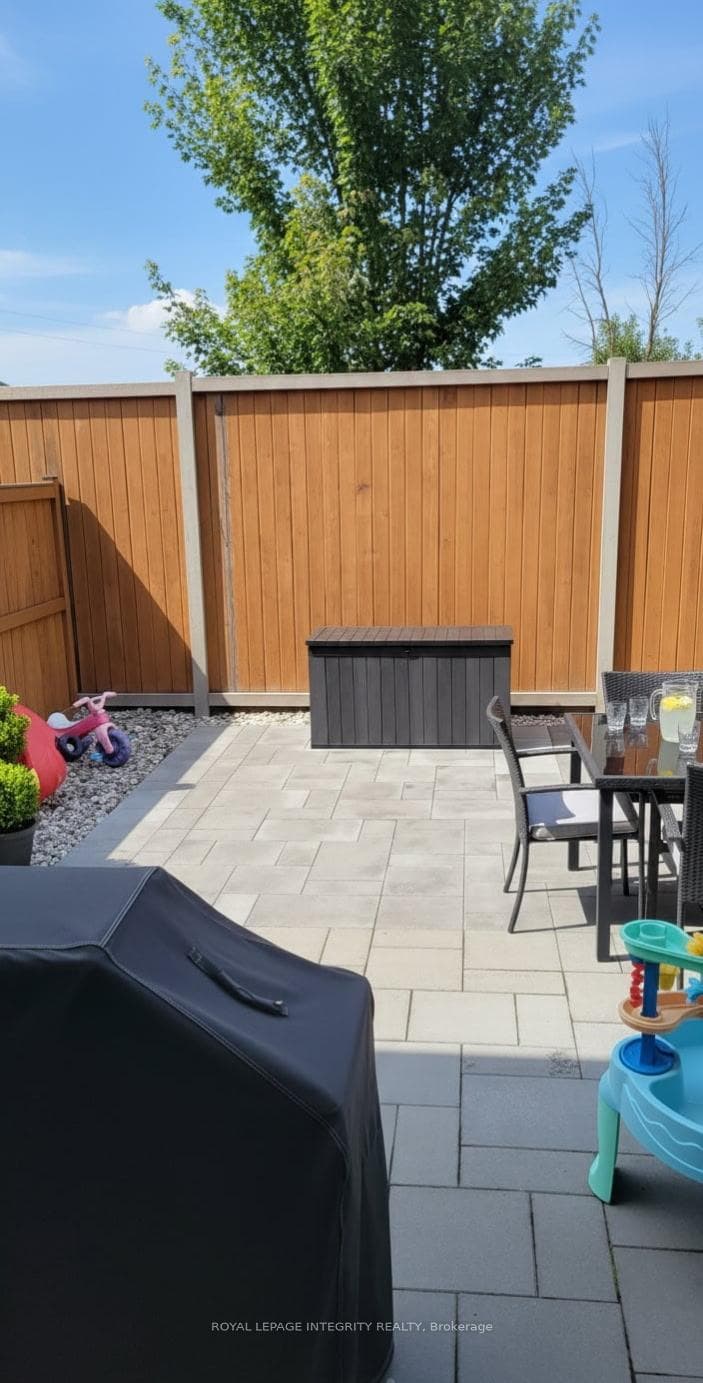 Hardscaped back yard for summer lounging