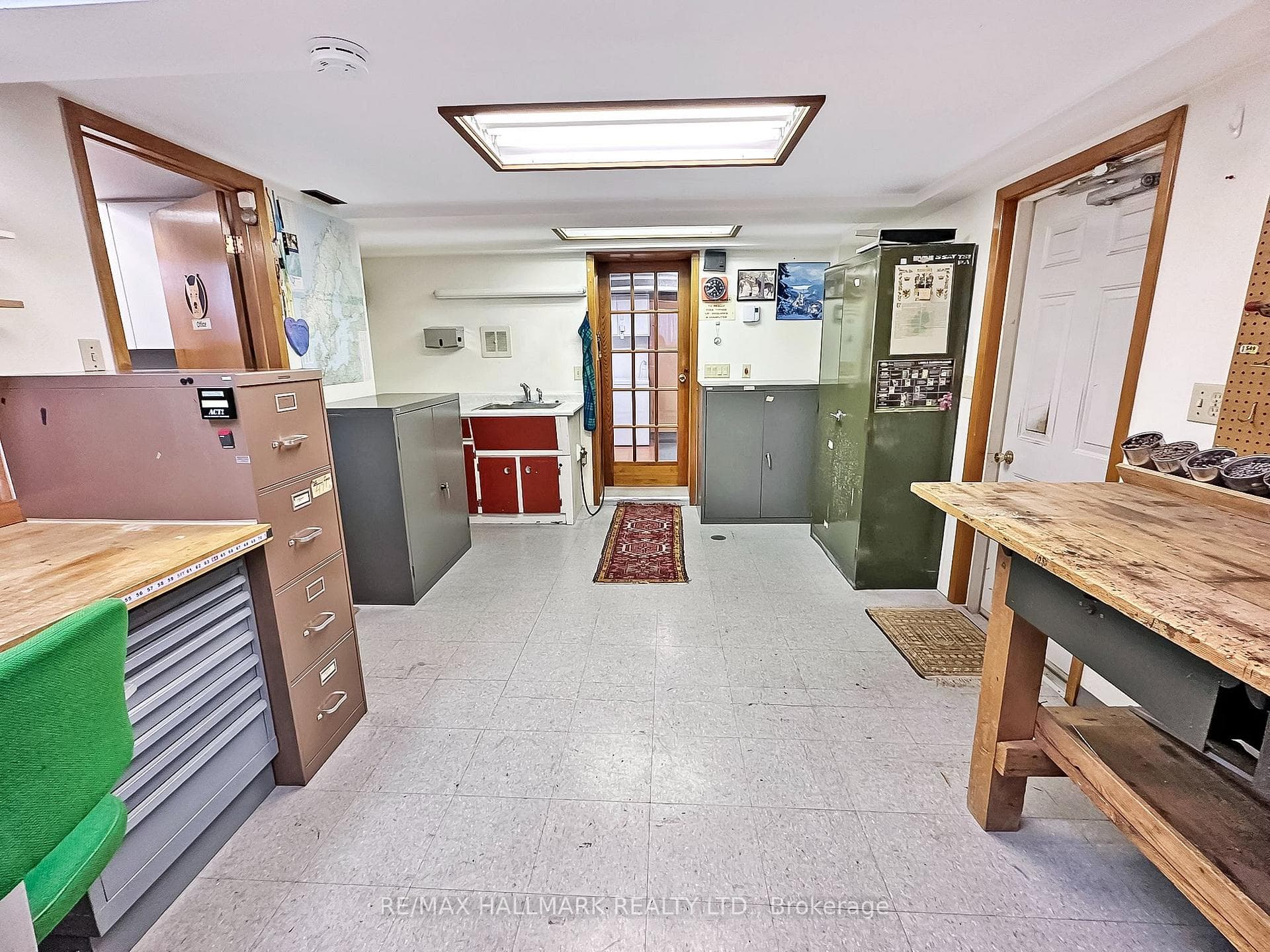 Work shop with access to garage/laundry sink