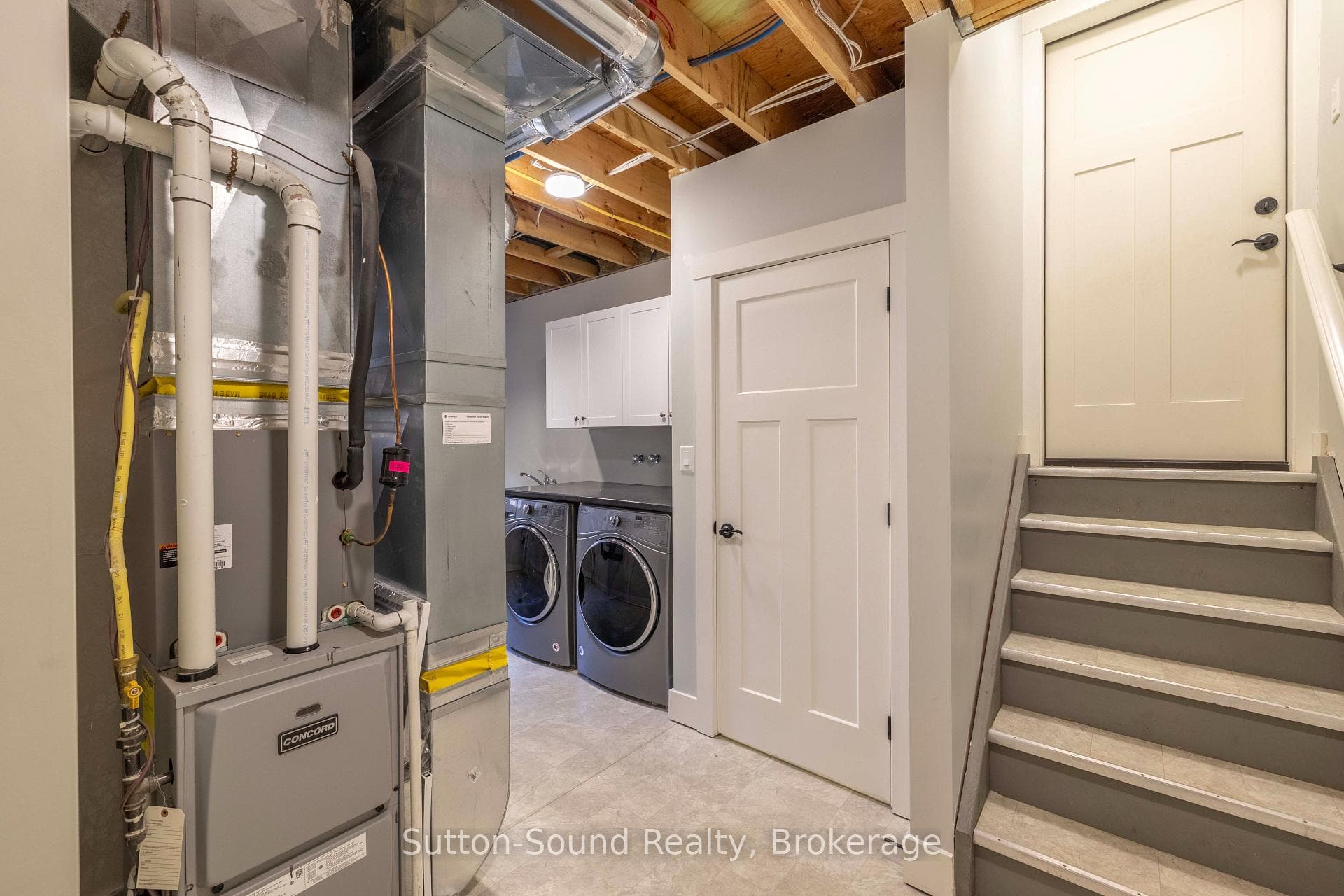 Lower Level Laundry with Access to Garage