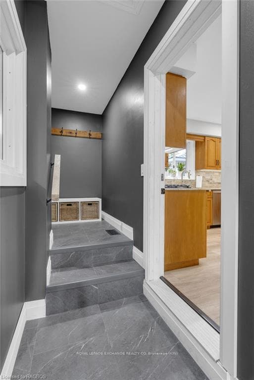 Mudroom access off of kitchen - luxury vinyl tile