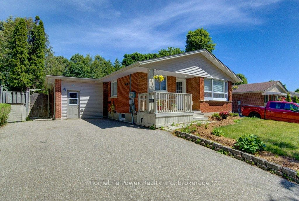 Front Elevation Brick exterior w/attached garage