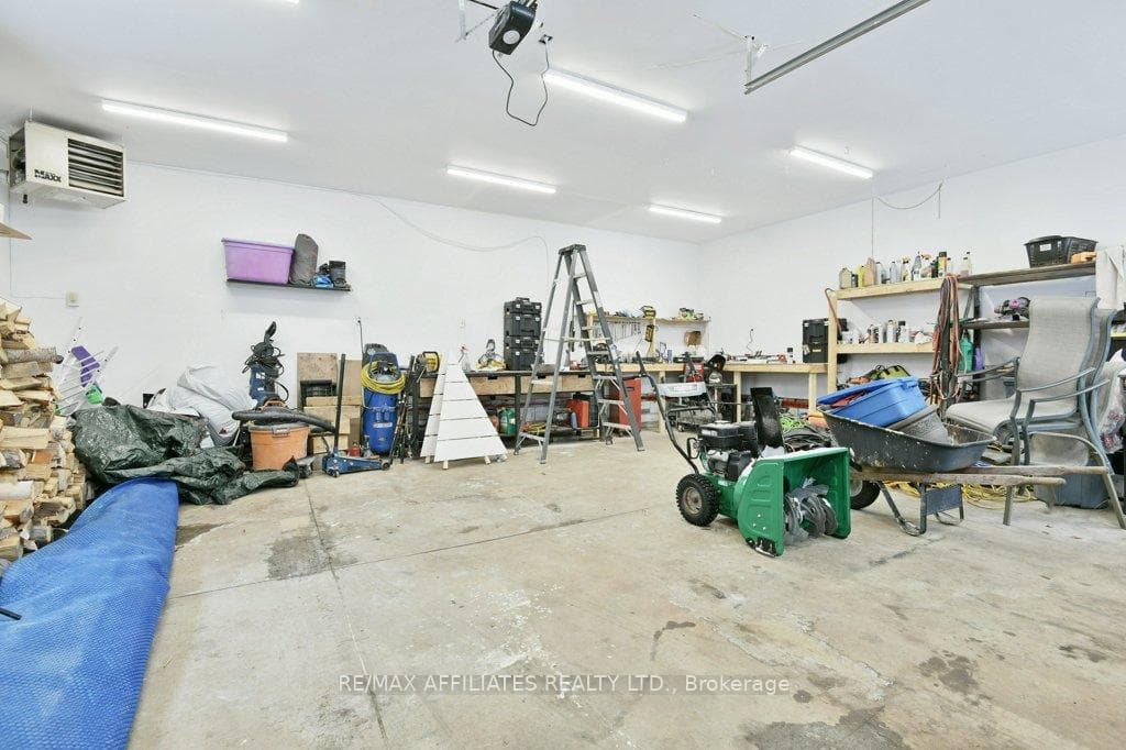Concrete floor, drywalled, auto garage door opener