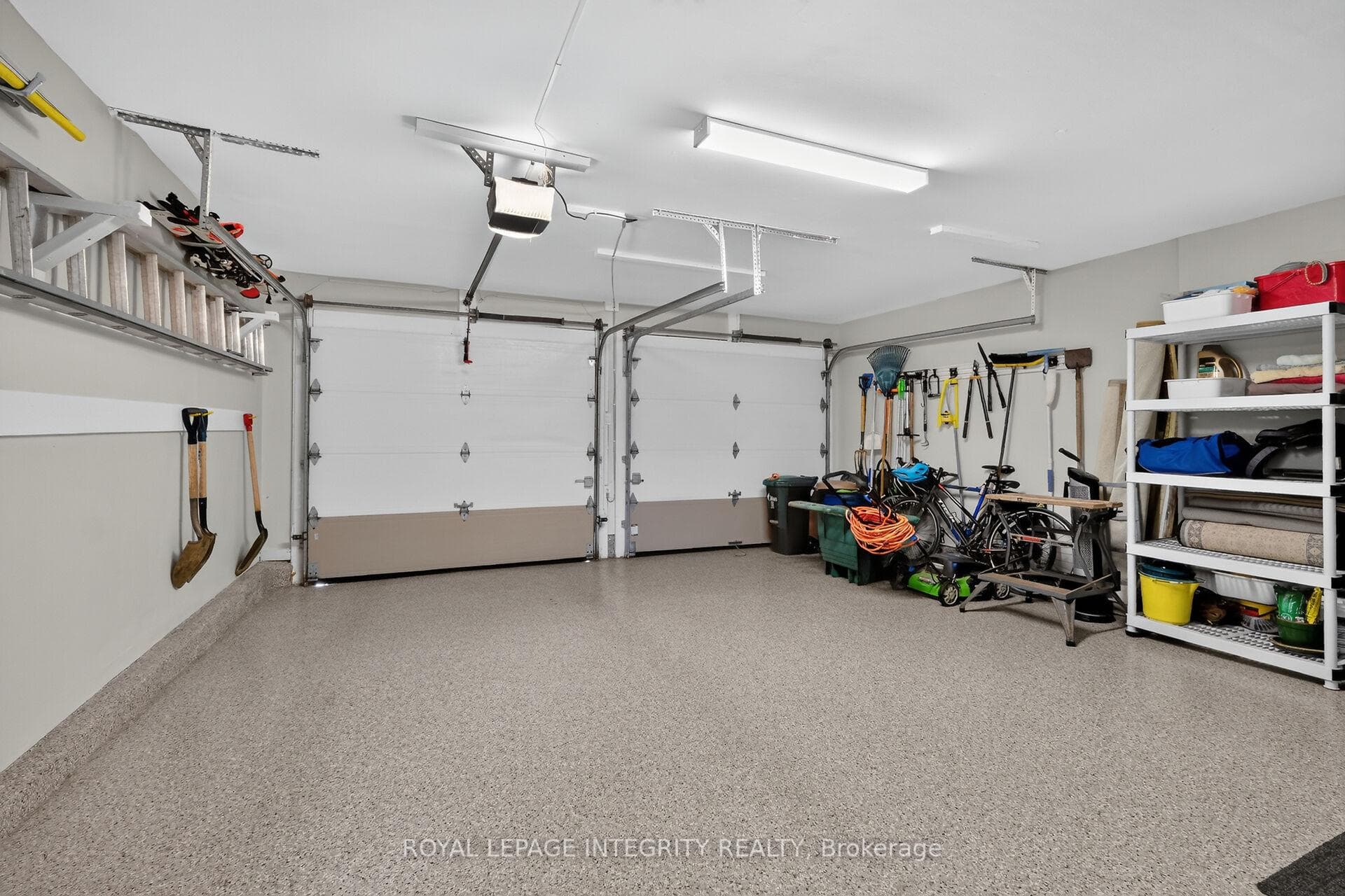Polyaspartic garage floor & insulated Garage doors