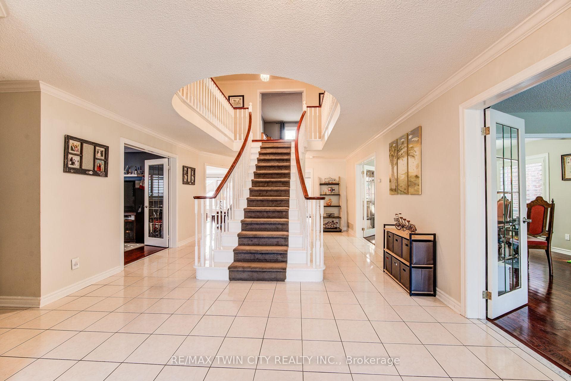Foyer showing staircase and office/den to the left