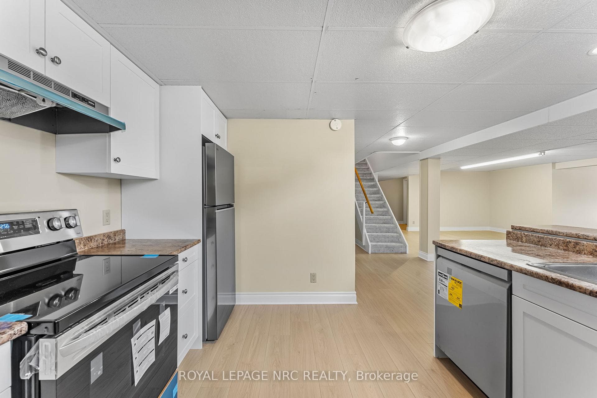 Great in-law potential. 2nd kitchen & laundry.