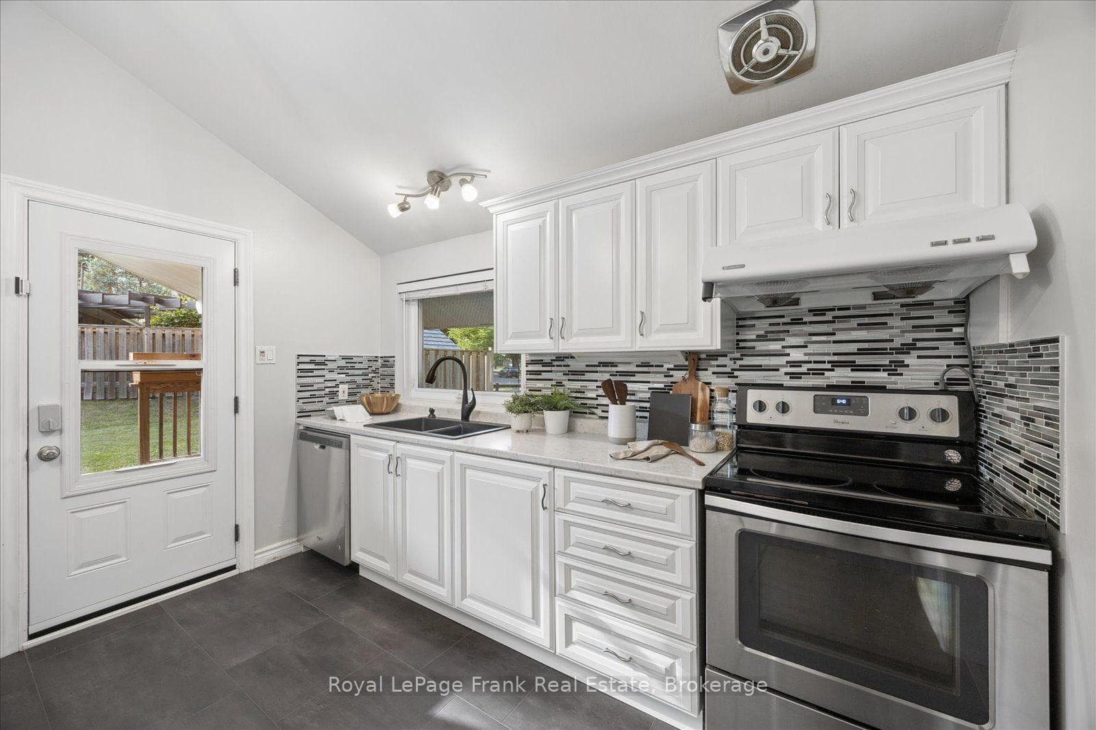 Updated Kitchen with Side Door to Covered Patio