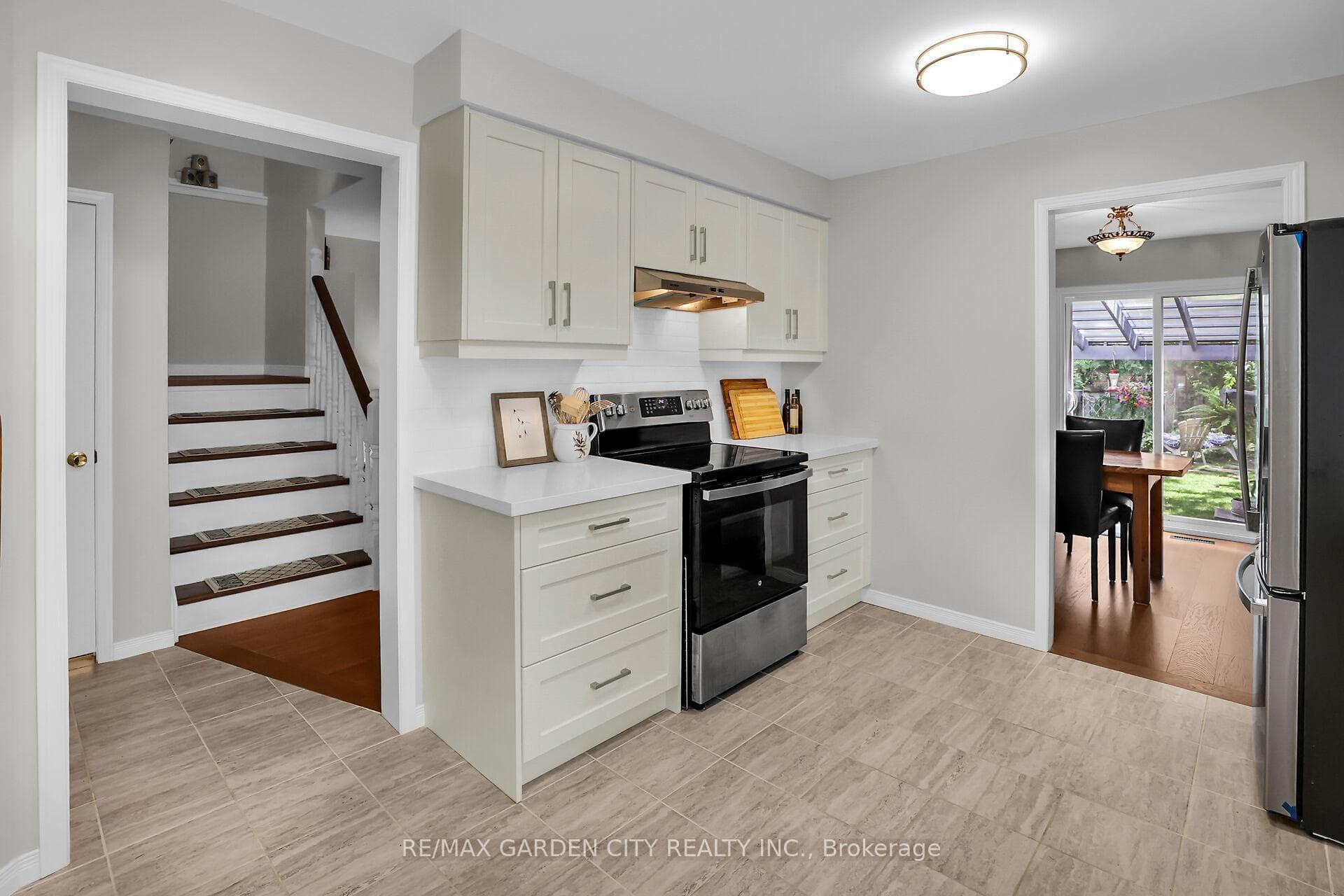 Kitchen views directly to backyard