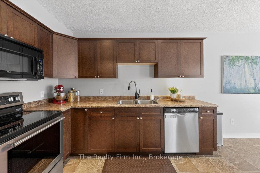 Plenty of cupboards, appliances included