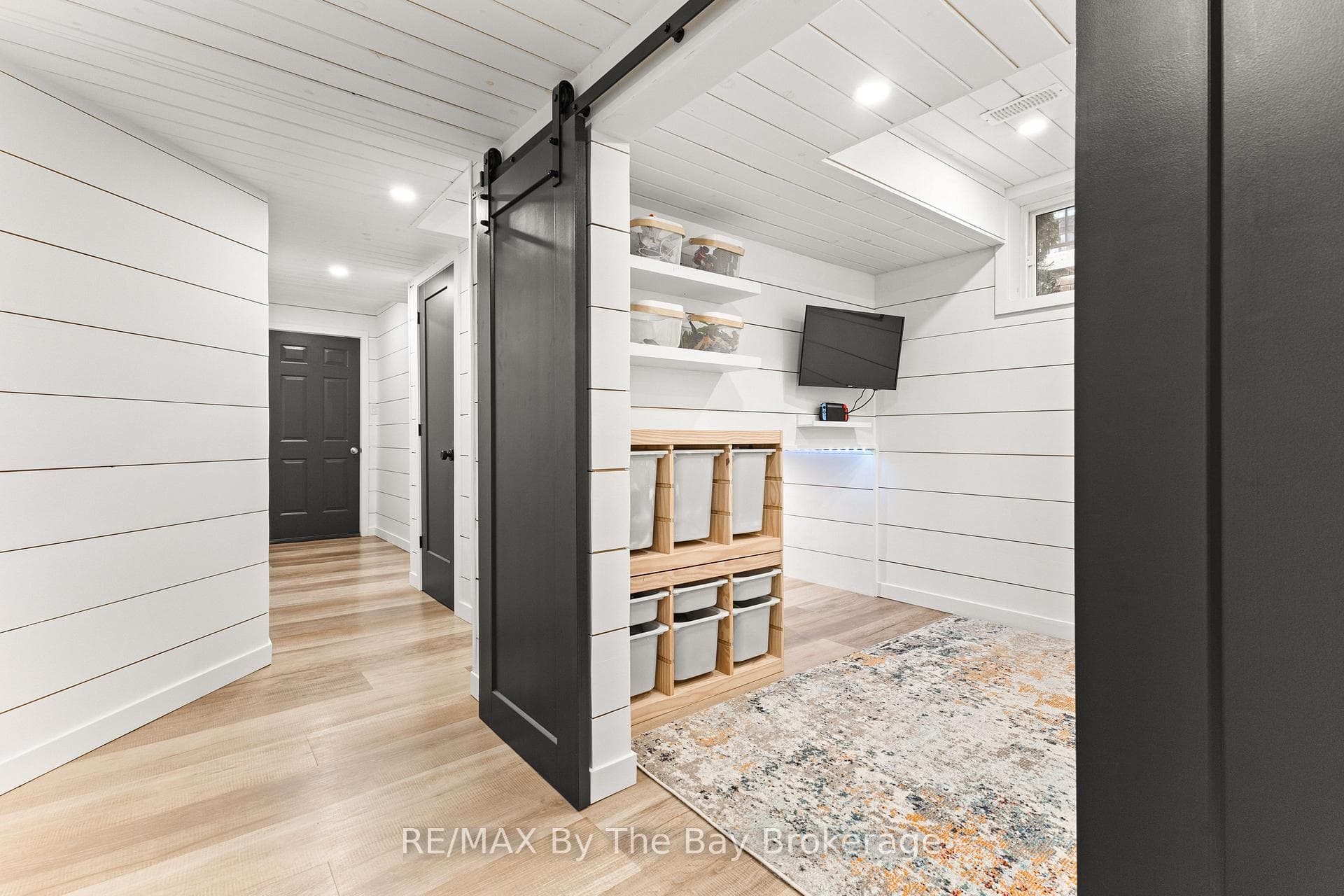 Double barn doors - play room w/ under stair nook