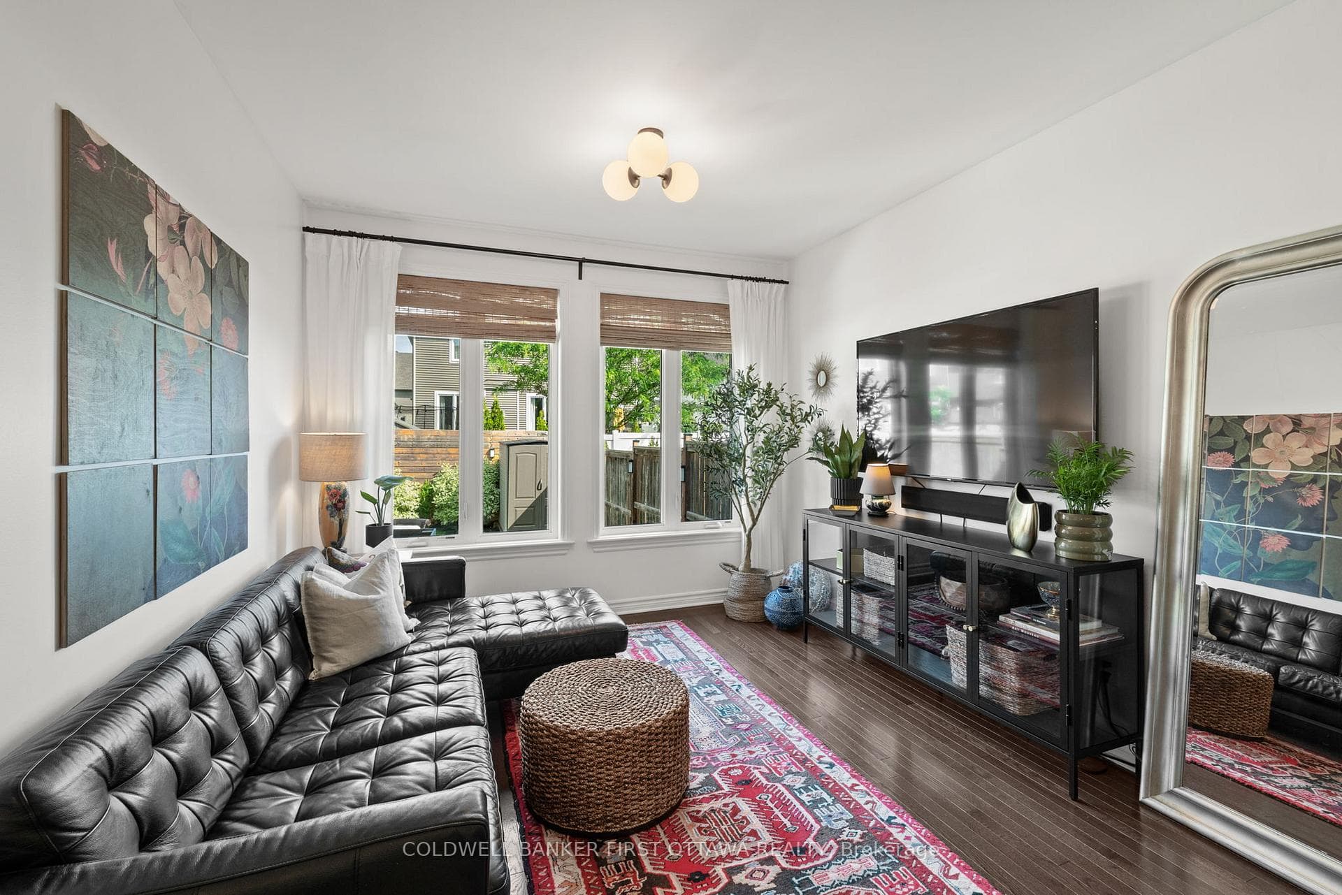 Bright living room space w wall to wall window!