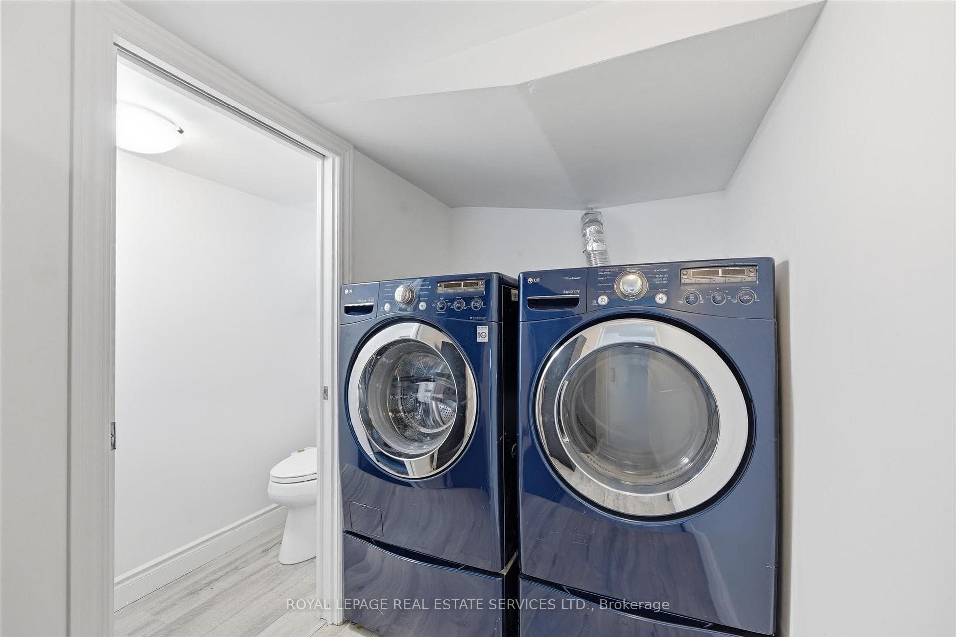 Laundry Room with Luxury Vinyl Flooring (2021)