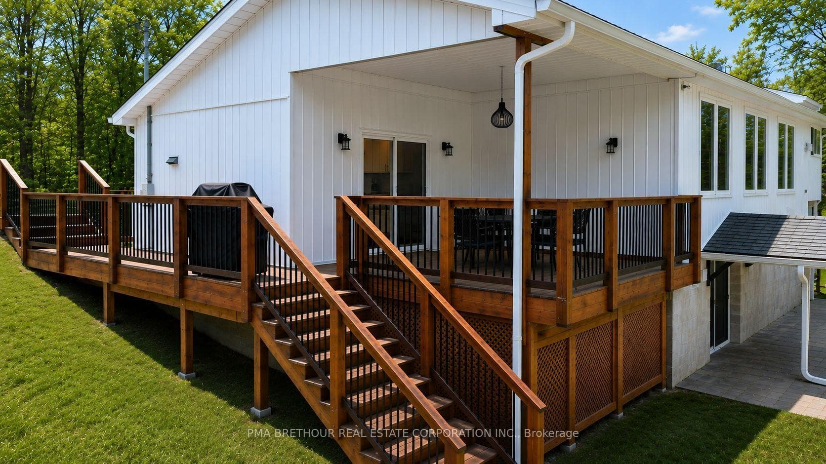 Exterior Rear of Home and Covered Deck