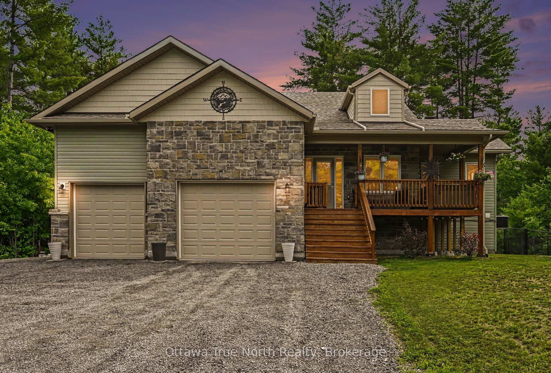 1196 Flat Rapids Road photo 2