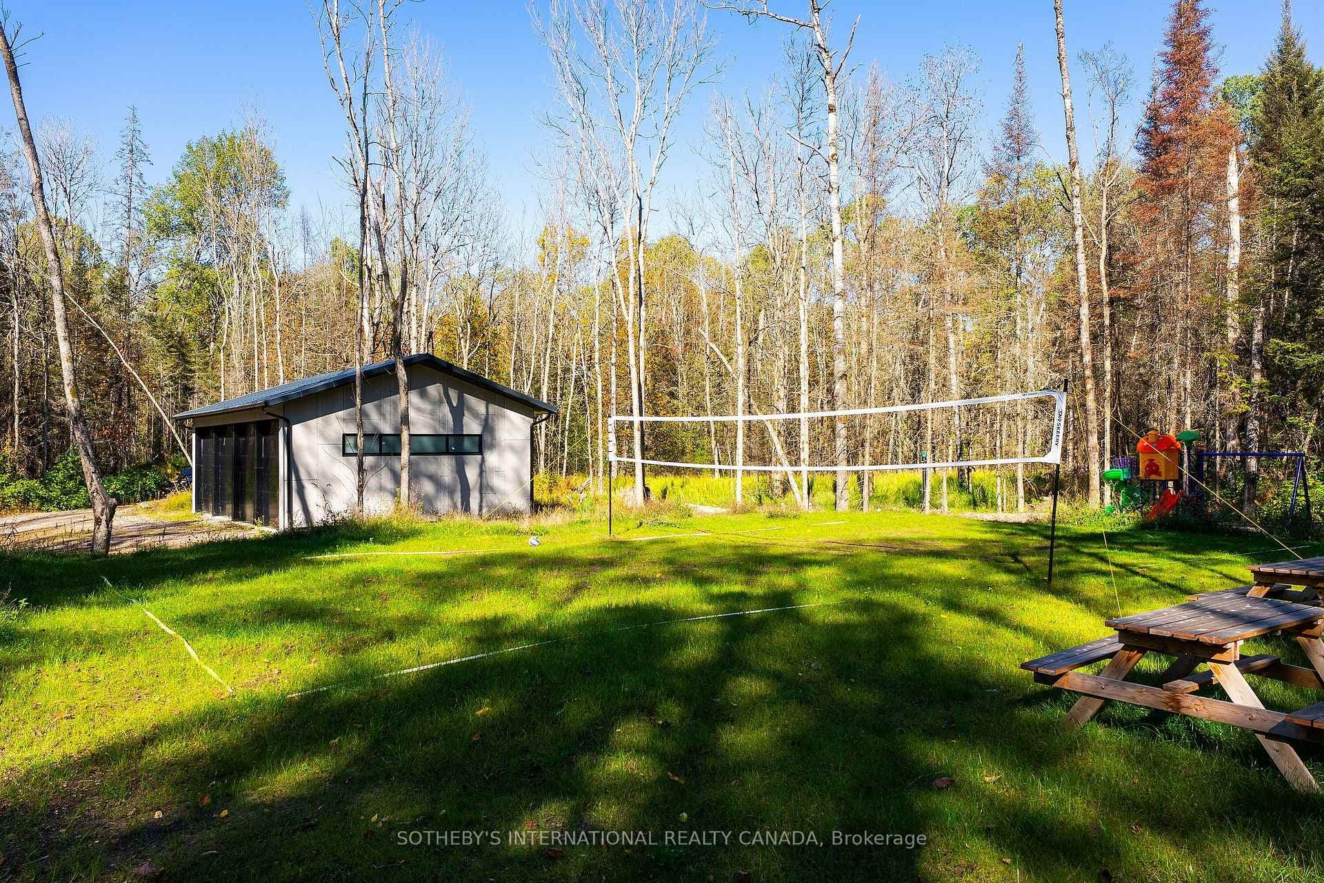 Grassy Volleyball Court & Garage