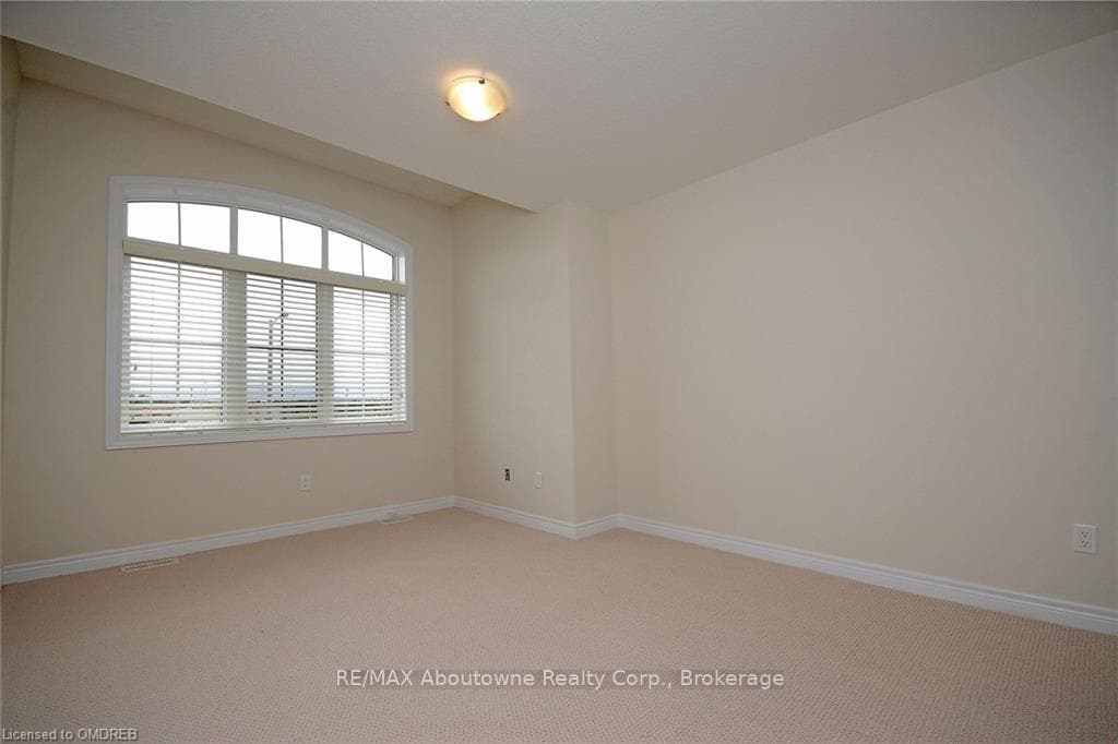 Spare room with light carpet
