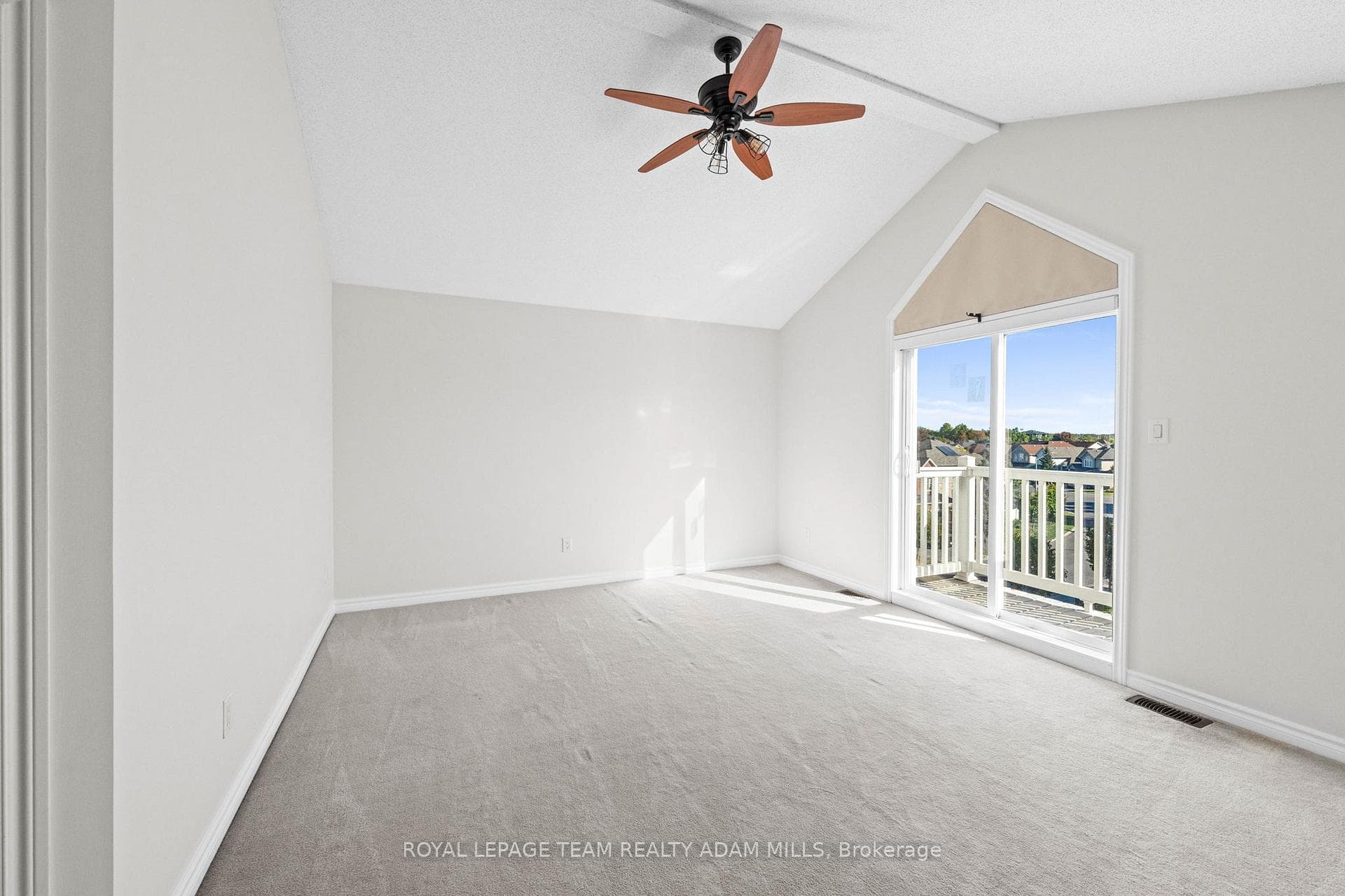 Primary bedroom with private balcony