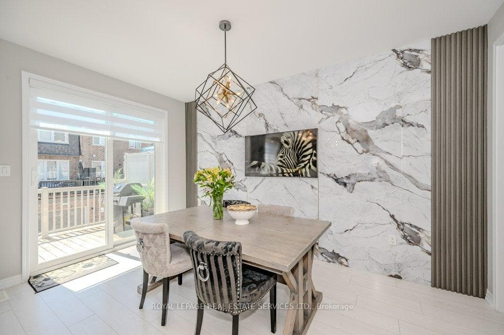 Dining Room with a Walk-Out to a Large Balcony