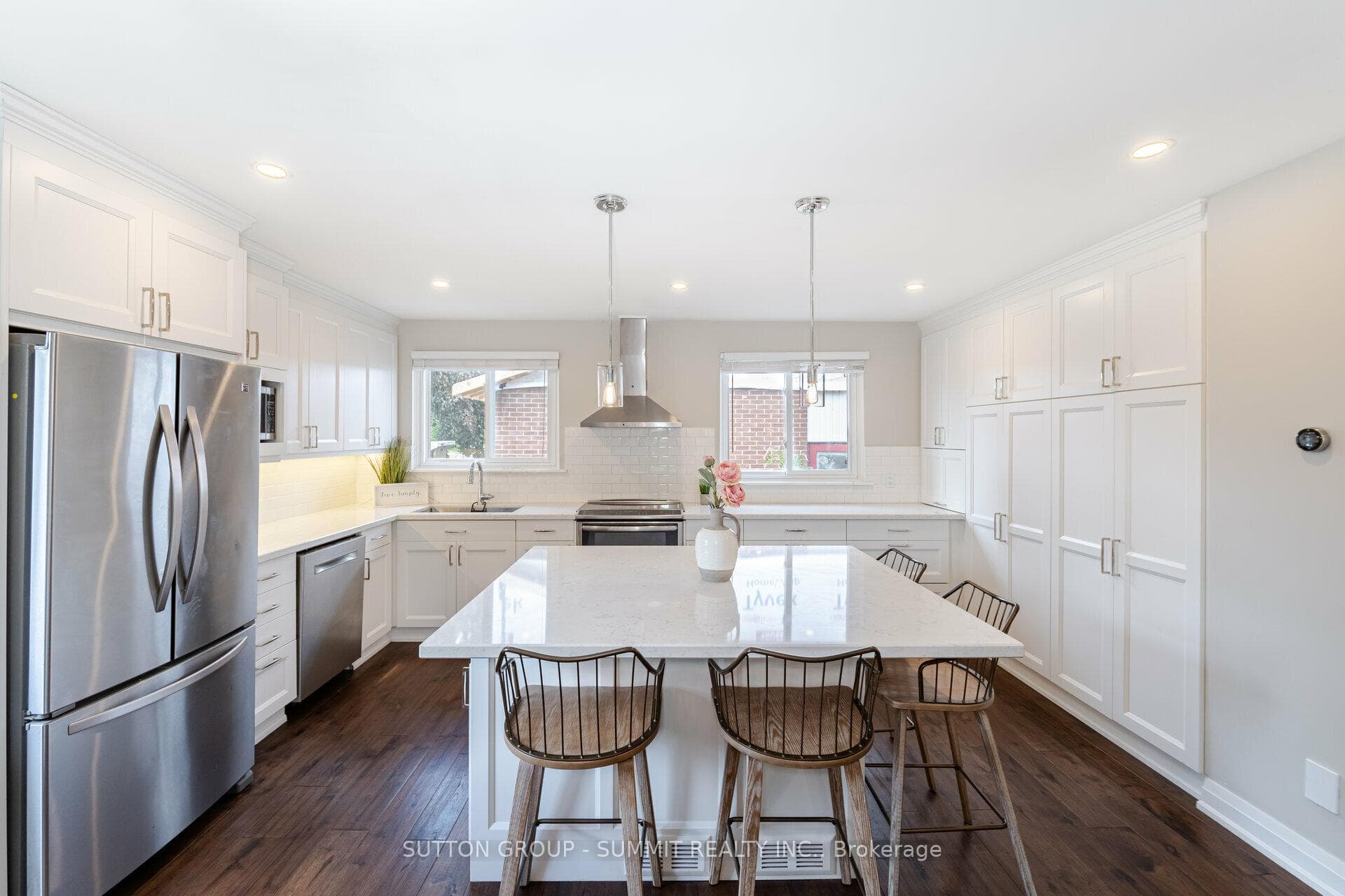 Renovated kitchen with island, quartz and pantry-