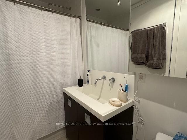 Tub with overhead shower