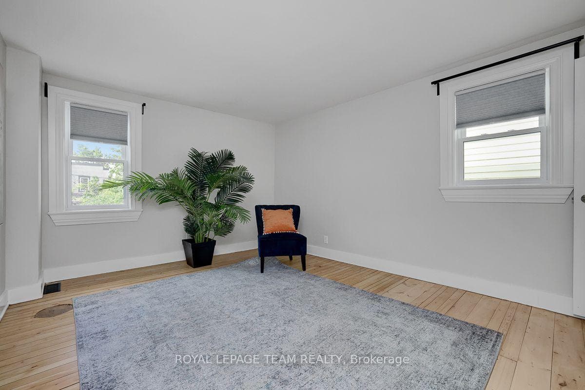 Large primary bedroom can fit a king-size bed.