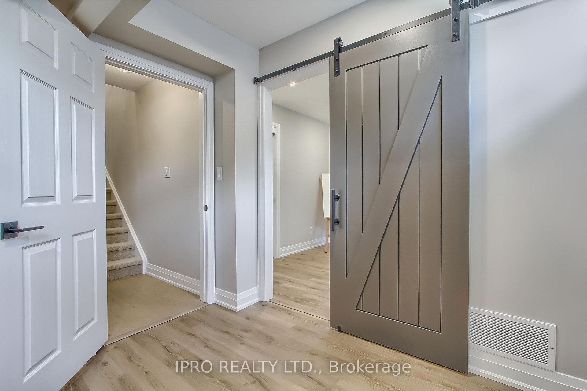 Bedroom 4- basement-sliding barn door entrance