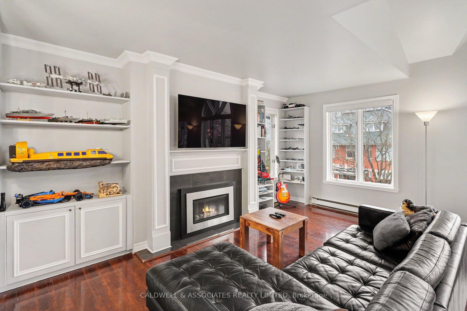LIVING ROOM W/FIREPLACE AND BUILT-INS